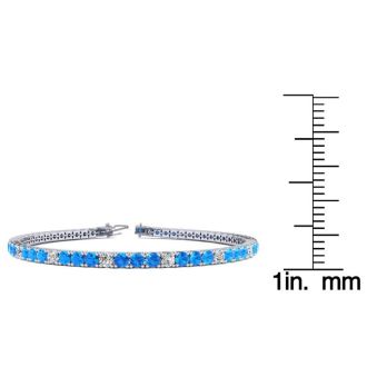 4 1/4 Carat Blue Topaz And Diamond Alternating Tennis Bracelet In 14 Karat White Gold, 8 Inches