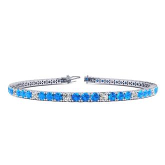 4 3/4 Carat Blue Topaz And Diamond Alternating Tennis Bracelet In 14 Karat White Gold, 9 Inches