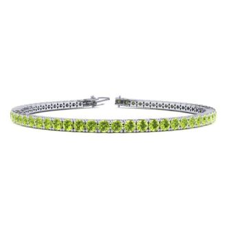4 Carat Peridot Tennis Bracelet In 14 Karat White Gold, 8 1/2 Inches