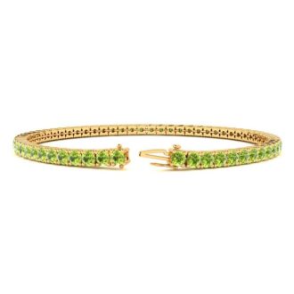 3 Carat Peridot Tennis Bracelet In 14 Karat Yellow Gold, 6 1/2 Inches