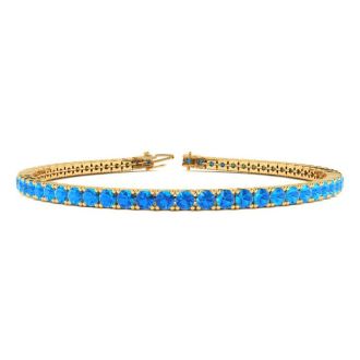 4 1/3 Carat Blue Topaz Tennis Bracelet In 14 Karat Yellow Gold, 7 1/2 Inches