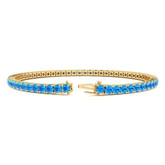 4 1/3 Carat Blue Topaz Tennis Bracelet In 14 Karat Yellow Gold, 7 1/2 Inches