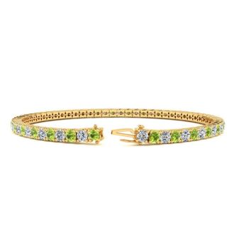 3 1/4 Carat Peridot And Diamond Tennis Bracelet In 14 Karat Yellow Gold, 7 1/2 Inches