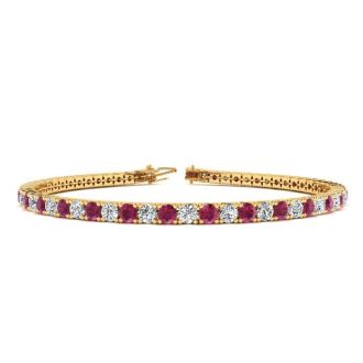 Ruby Bracelet; Ruby Tennis Bracelet; 4 1/4 Carat Ruby And Diamond Tennis Bracelet In 14 Karat Yellow Gold