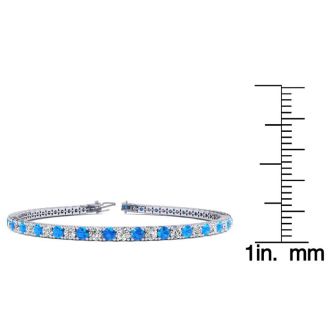 4 1/3 Carat Blue Topaz And Diamond Tennis Bracelet In 14 Karat White Gold, 9 Inches
