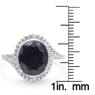 5 1/2 Carat Sapphire and Halo Diamond Ring In Sterling Silver.