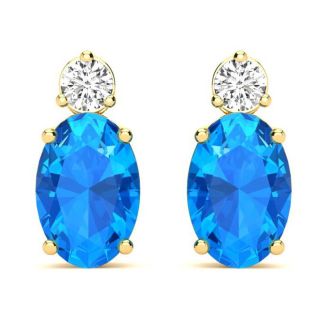 1 Carat Oval Blue Topaz and Diamond Stud Earrings In 14 Karat Yellow Gold