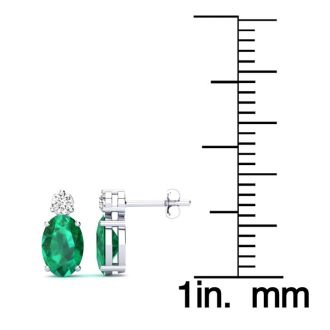 1 Carat Oval Emerald and Diamond Stud Earrings In 14 Karat White Gold