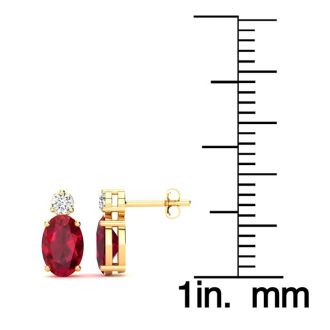 1 Carat Oval Ruby and Diamond Stud Earrings In 14 Karat Yellow Gold