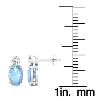 Aquamarine Earrings: Aquamarine Jewelry: 1 2/3 Carat Oval Aquamarine and Diamond Stud Earrings In 14 Karat White Gold