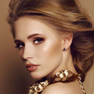 2 Carat Oval Tanzanite and Diamond Stud Earrings In 14 Karat Yellow Gold