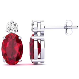 2 Carat Oval Ruby and Diamond Stud Earrings In 14 Karat White Gold