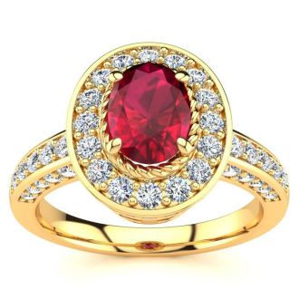 1 1/2 Carat Oval Shape Ruby and Halo Diamond Ring In 14 Karat Yellow Gold