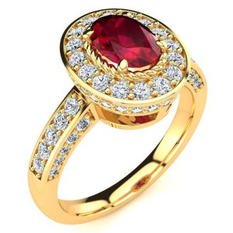 1 1/2 Carat Oval Shape Ruby and Halo Diamond Ring In 14 Karat Yellow Gold