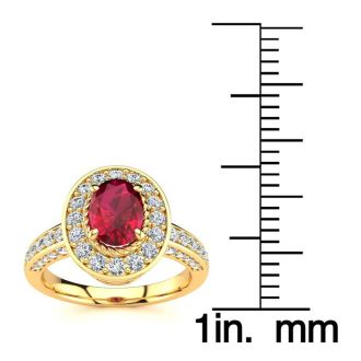 1 1/2 Carat Oval Shape Ruby and Halo Diamond Ring In 14 Karat Yellow Gold