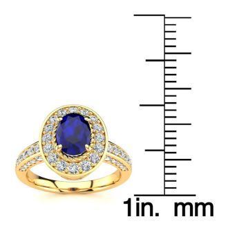 1 2/3 Carat Oval Shape Sapphire and Halo Diamond Ring In 14 Karat Yellow Gold