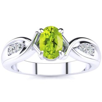 1 Carat Oval Shape Peridot and Four Diamond Ring In 10 Karat White Gold