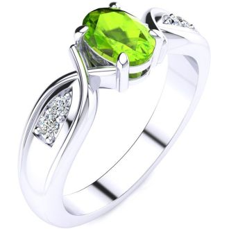 1 Carat Oval Shape Peridot and Four Diamond Ring In 10 Karat White Gold