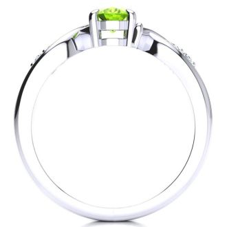 1 Carat Oval Shape Peridot and Four Diamond Ring In 10 Karat White Gold