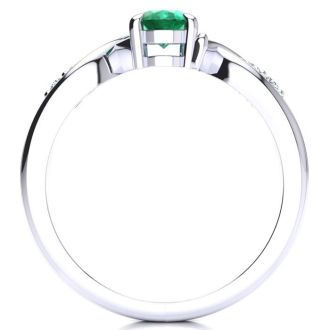 1 Carat Oval Shape Emerald and Four Diamond Ring In 10 Karat White Gold