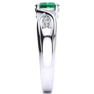 1 Carat Oval Shape Emerald and Four Diamond Ring In 10 Karat White Gold