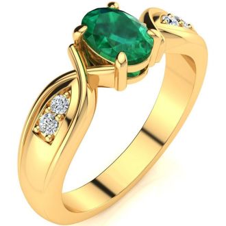 1 Carat Oval Shape Emerald and Four Diamond Ring In 10 Karat Yellow Gold