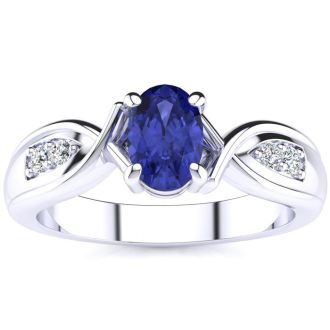 1 Carat Oval Shape Tanzanite and Four Diamond Ring In 10 Karat White Gold