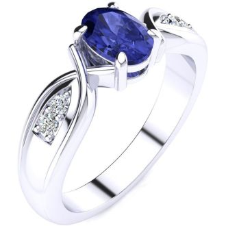 1 Carat Oval Shape Tanzanite and Four Diamond Ring In 10 Karat White Gold