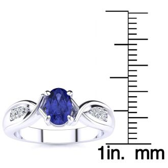 1 Carat Oval Shape Tanzanite and Four Diamond Ring In 10 Karat White Gold
