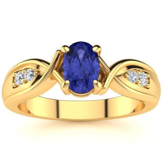 1 Carat Oval Shape Tanzanite and Four Diamond Ring In 10 Karat Yellow Gold