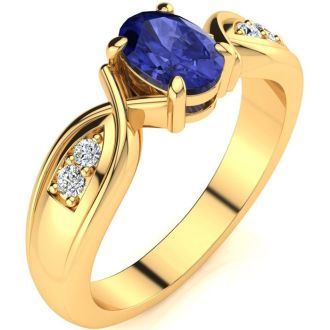 1 Carat Oval Shape Tanzanite and Four Diamond Ring In 10 Karat Yellow Gold
