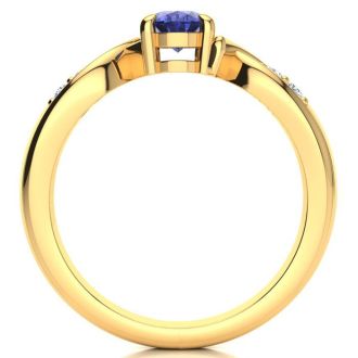 1 Carat Oval Shape Tanzanite and Four Diamond Ring In 10 Karat Yellow Gold