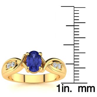 1 Carat Oval Shape Tanzanite and Four Diamond Ring In 10 Karat Yellow Gold
