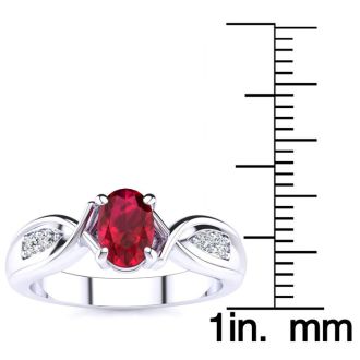 1 Carat Oval Shape Ruby and Four Diamond Ring In 10 Karat White Gold