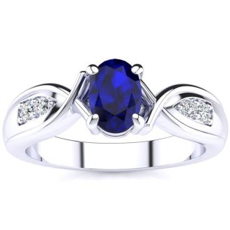 1 Carat Oval Shape Sapphire and Four Diamond Ring In 10 Karat White Gold