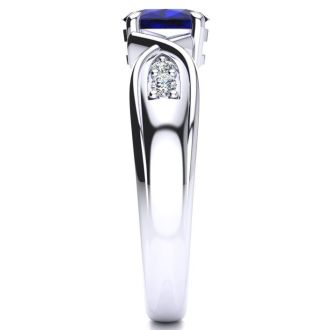 1 Carat Oval Shape Sapphire and Four Diamond Ring In 10 Karat White Gold