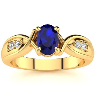 1 Carat Oval Shape Sapphire and Four Diamond Ring In 10 Karat Yellow Gold