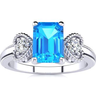 1 1/3 Carat Blue Topaz and Two Diamond Heart Ring In 10 Karat White Gold