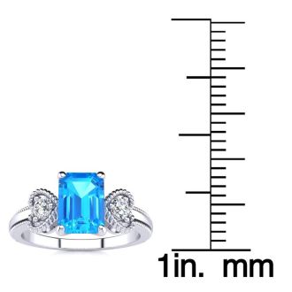 1 1/3 Carat Blue Topaz and Two Diamond Heart Ring In 10 Karat White Gold