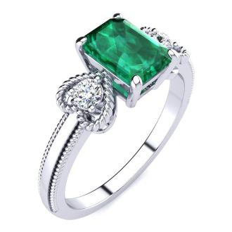 1 Carat Emerald and Two Diamond Heart Ring In 10 Karat White Gold