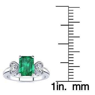1 Carat Emerald and Two Diamond Heart Ring In 10 Karat White Gold