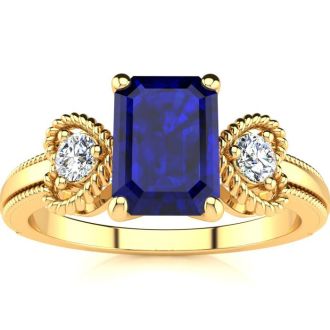 1 1/4 Carat Sapphire and Two Diamond Heart Ring In 10 Karat Yellow Gold