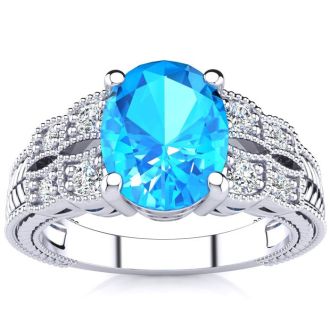 2 1/3 Carat Oval Shape Blue Topaz and Diamond Ring In 10 Karat White Gold