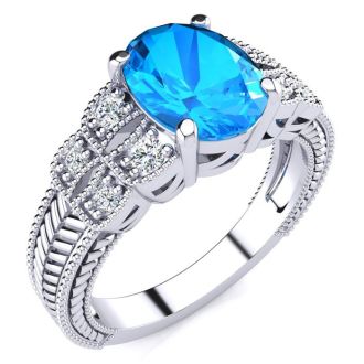 2 1/3 Carat Oval Shape Blue Topaz and Diamond Ring In 10 Karat White Gold