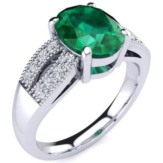 2 Carat Oval Shape Emerald and Diamond Ring In 14 Karat White Gold