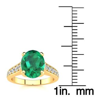 2 1/4 Carat Oval Shape Emerald and Diamond Ring In 14 Karat Yellow Gold