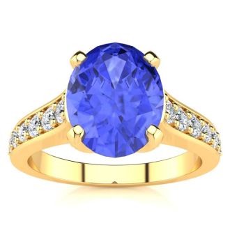 2 1/4 Carat Oval Shape Tanzanite and Diamond Ring In 14 Karat Yellow Gold