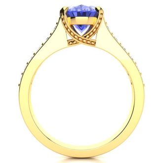 2 1/4 Carat Oval Shape Tanzanite and Diamond Ring In 14 Karat Yellow Gold