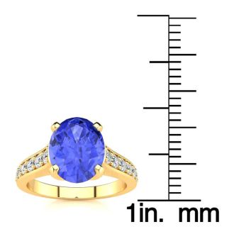 2 1/4 Carat Oval Shape Tanzanite and Diamond Ring In 14 Karat Yellow Gold