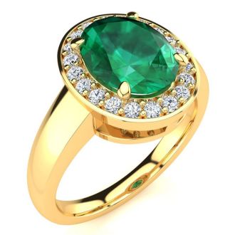 2 Carat Oval Shape Emerald and Halo Diamond Ring In 14 Karat Yellow Gold